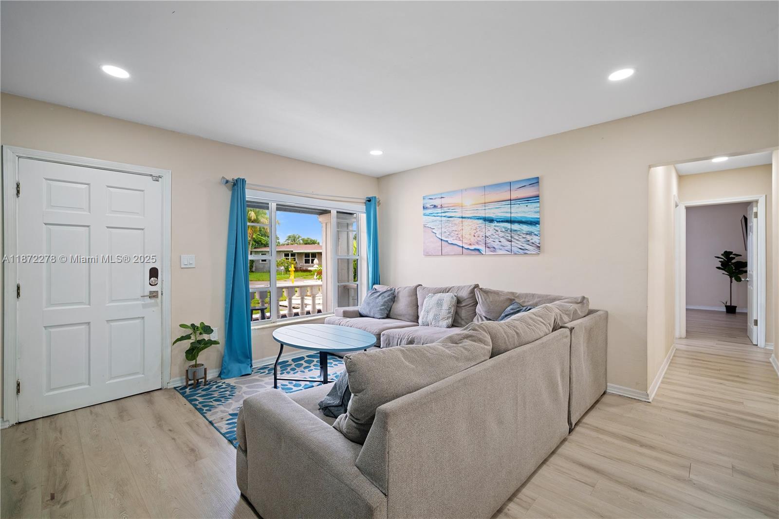 951 Northwest 148th Street Miami, FL 33168 - Photo 8 of 34 a living room with furniture and wooden floor
