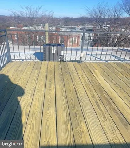 a view of swimming pool with a lounge chair