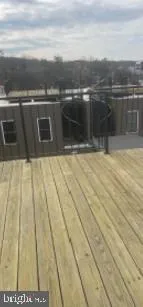 a view of swimming pool with lake and mountain view