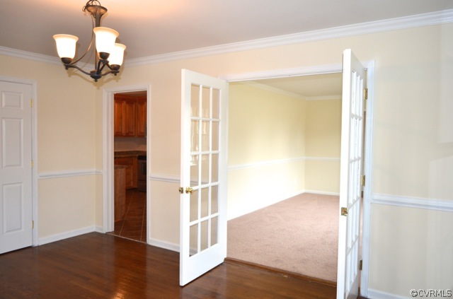 800 Perrymont Road Hopewell, VA 23860 - Photo 8 of 15 a view of a hallway with wooden floor and staircase