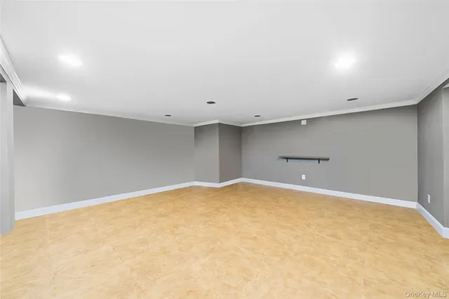 an empty room with a stairs