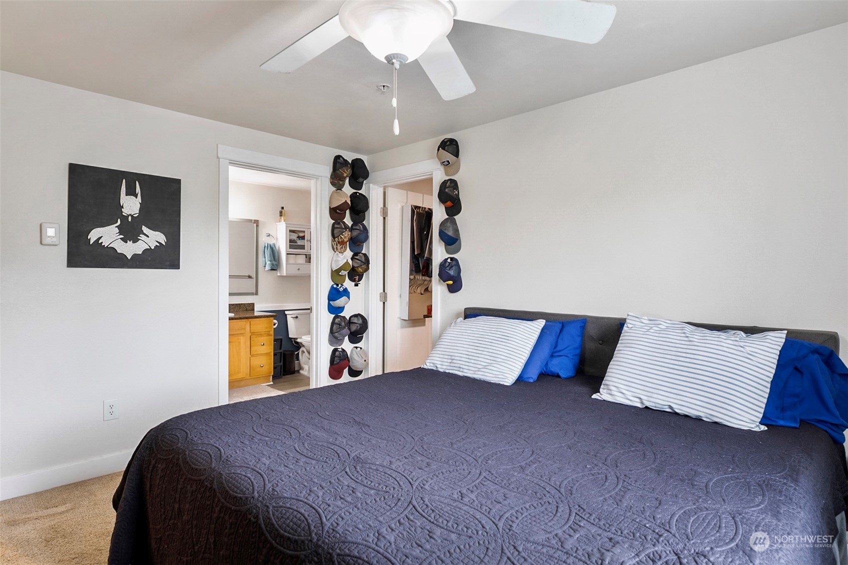 16409 Currie Road Southeast, Unit 305 Monroe, WA 98272 - Photo 9 of 23 a bedroom with a large bed and a large window