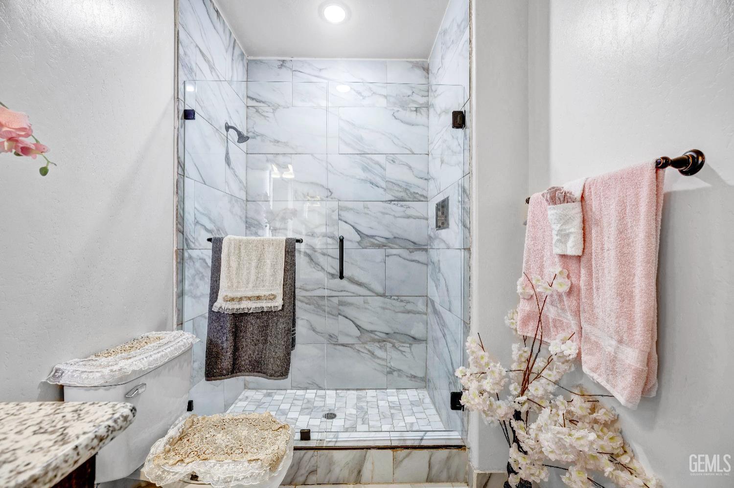 Undisclosed Address Taft, CA 93268 - Photo 18 of 43 a bathroom with a granite countertop shower a toilet and a sink