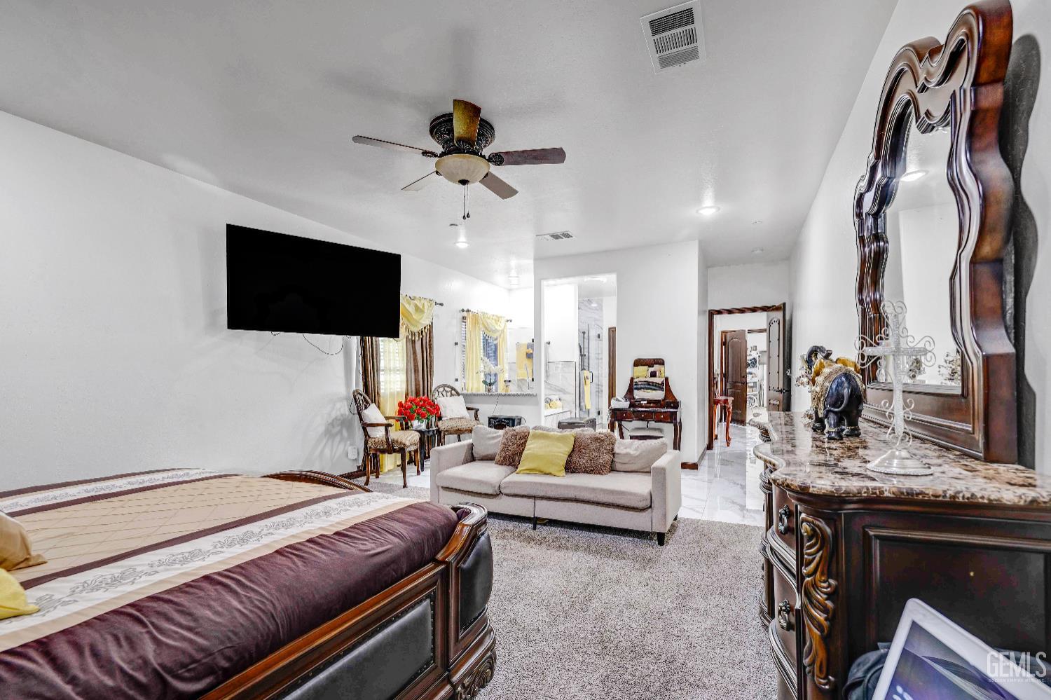 Undisclosed Address Taft, CA 93268 - Photo 24 of 43 a living room with furniture and a flat screen tv