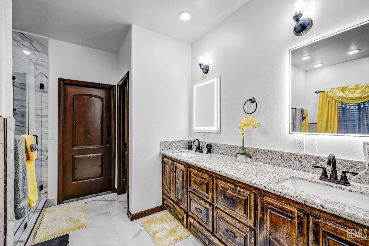Undisclosed Address Taft, CA 93268 - Photo 25 of 43 a bathroom with a granite countertop double vanity sink and a mirror