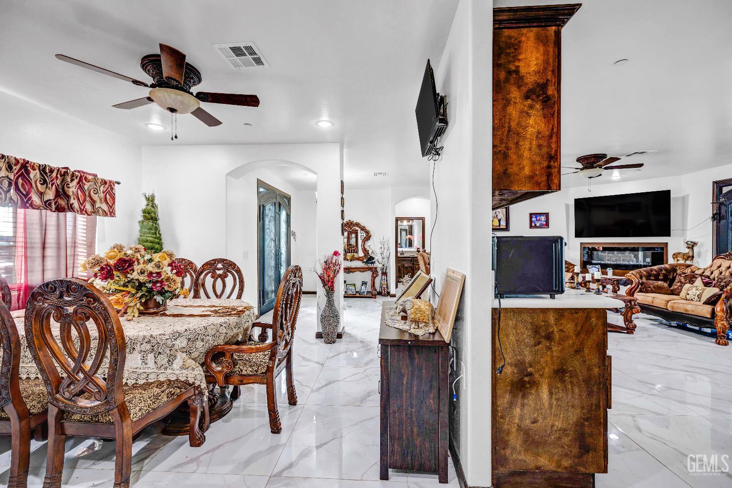 Undisclosed Address Taft, CA 93268 - Photo 33 of 43 a living room with furniture and a flat screen tv