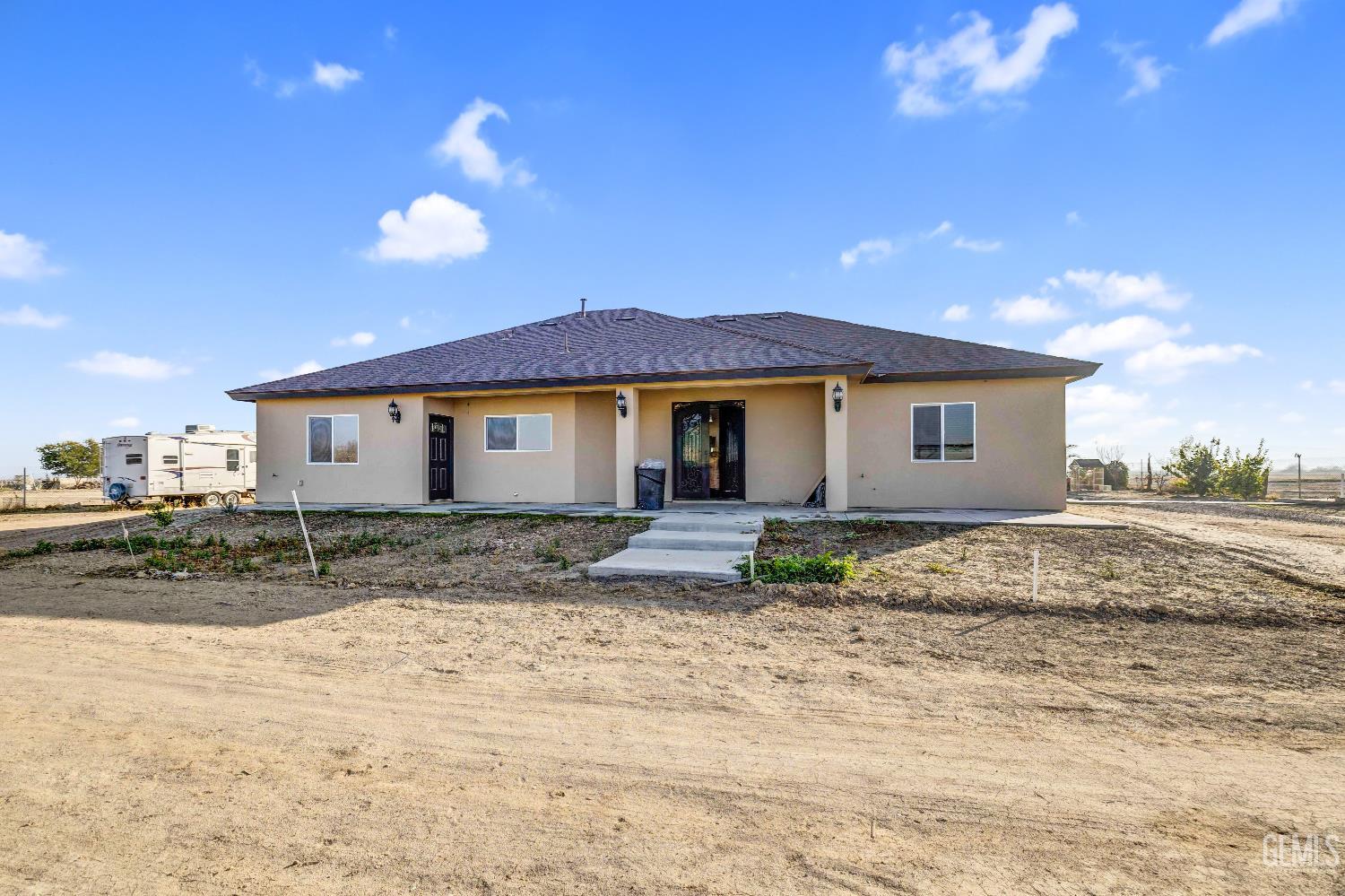 Undisclosed Address Taft, CA 93268 - Photo 36 of 43 a view of a house with a backyard