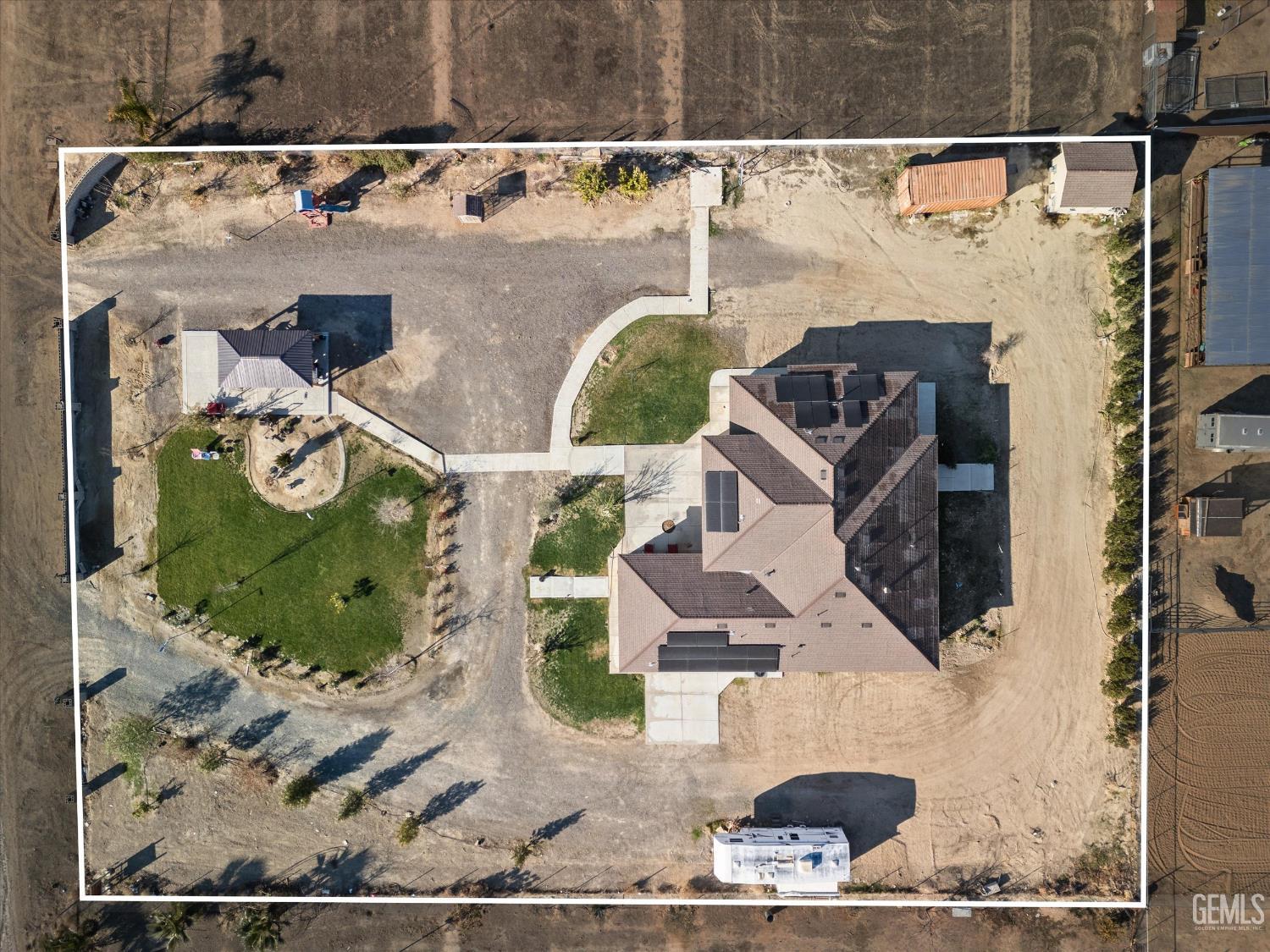 Undisclosed Address Taft, CA 93268 - Photo 43 of 43 an aerial view of a house with a yard