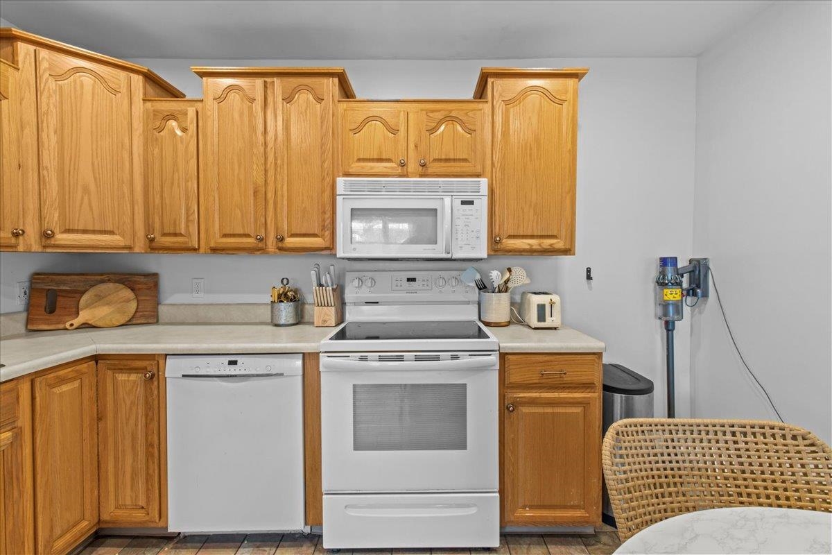 1351 Virginia Cape May, NJ 08204 - Photo 17 of 29 a kitchen with stainless steel appliances granite countertop a stove a sink and a microwave