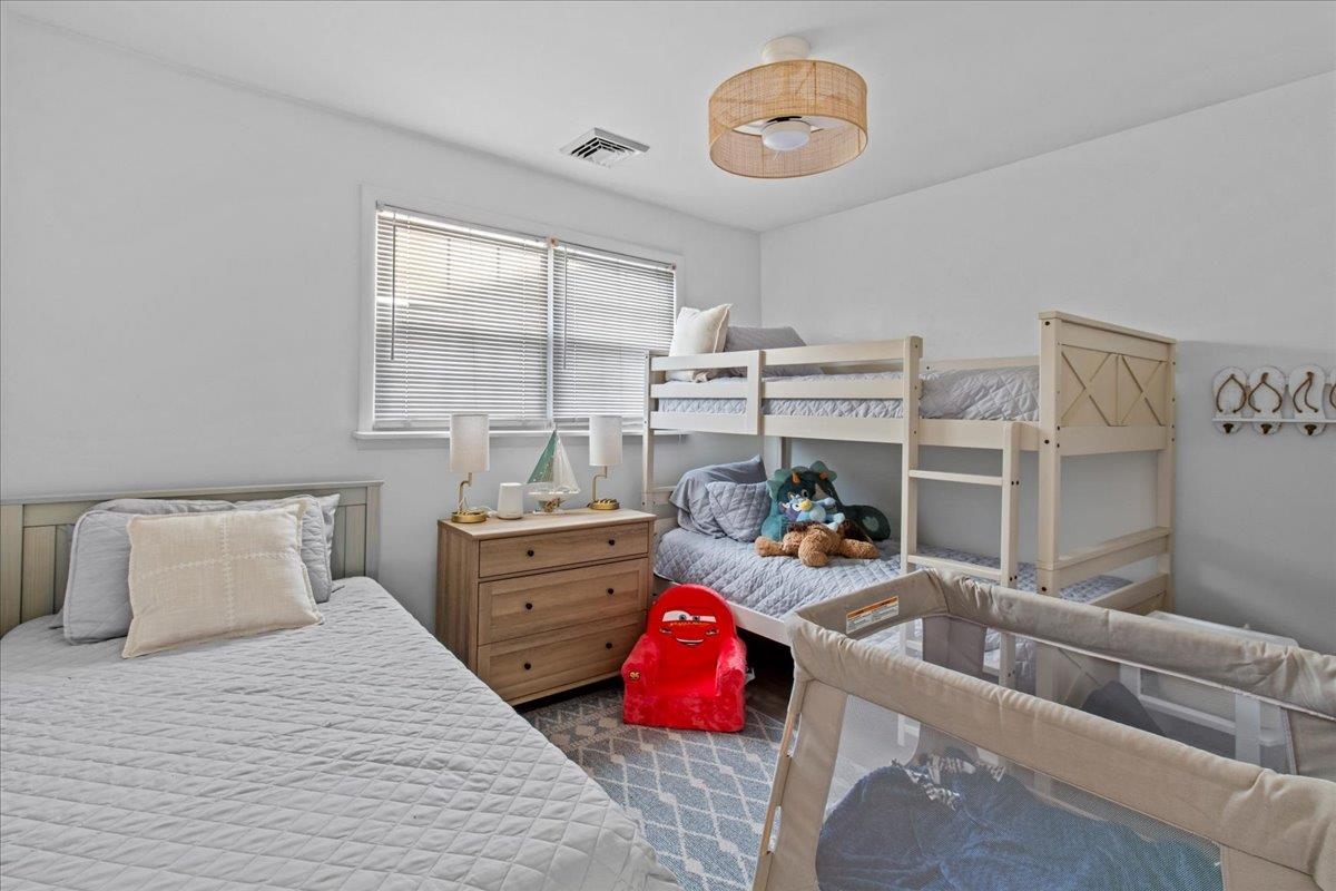 1351 Virginia Cape May, NJ 08204 - Photo 22 of 29 a bedroom with furniture and a window