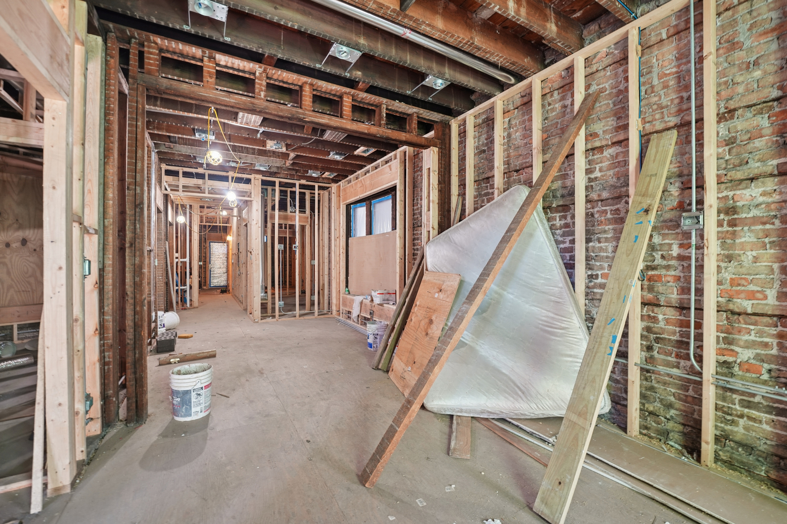 3124 West 15th Place Chicago, IL 60623 - Photo 13 of 17 a view of an entryway with wooden floor and door