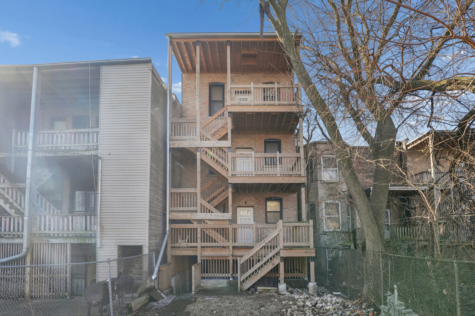 3124 West 15th Place Chicago, IL 60623 - Photo 17 of 17 a front view of a house with a balcony