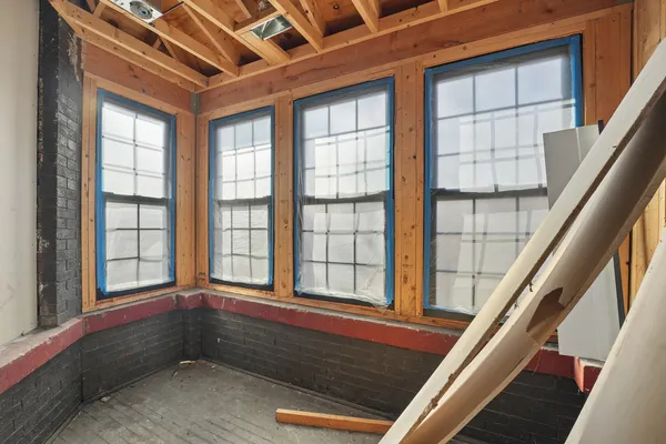 a view of an empty room with a window