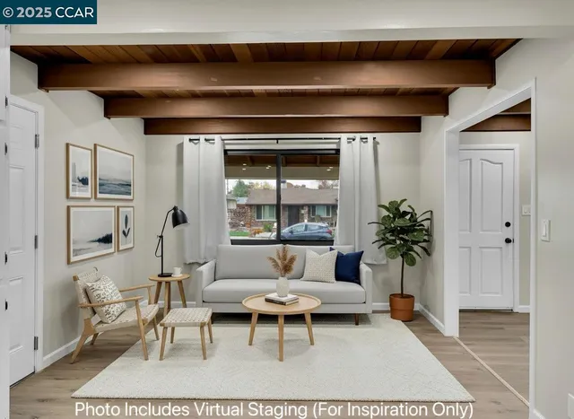 a kitchen with granite countertop white cabinets white stainless steel appliances and a sink