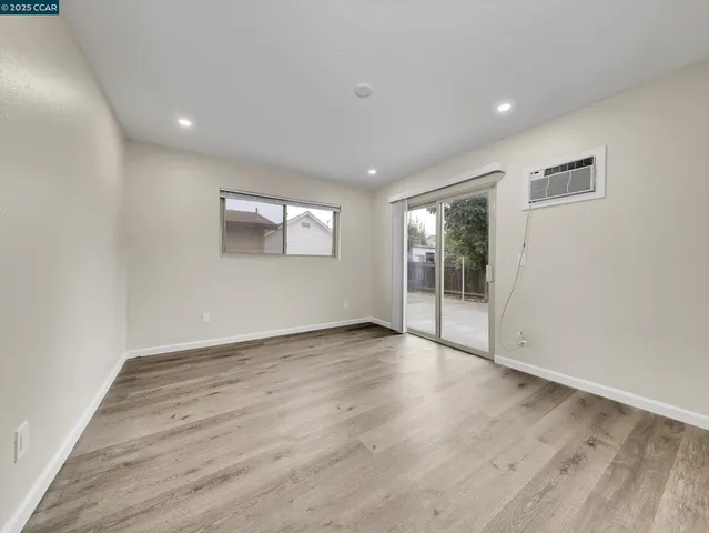 a bathroom with a toilet sink and a mirror
