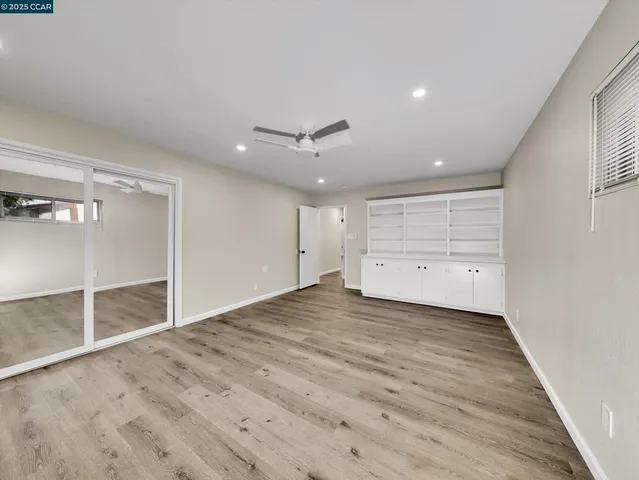 a bathroom with a granite countertop toilet a sink and bathtub