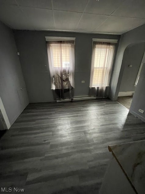 10210 Reno Avenue Cleveland, OH 44105 - Photo 10 of 26 Empty room featuring wood-type flooring