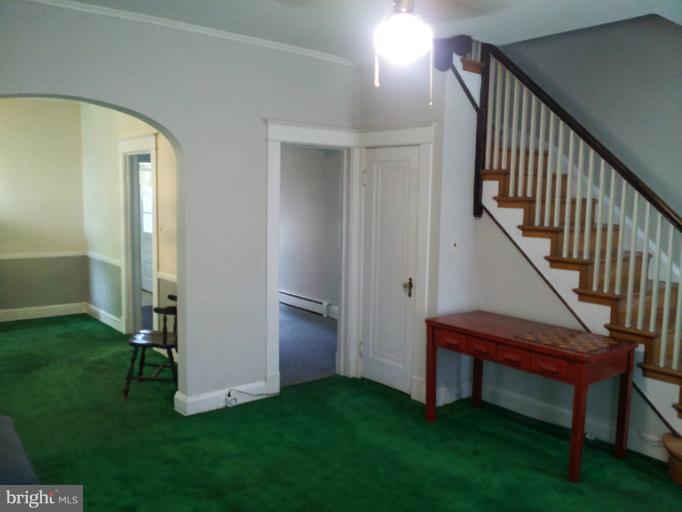 624 Stamford Road Baltimore, MD 21229 - Photo 5 of 21 a view of an entryway with a hall