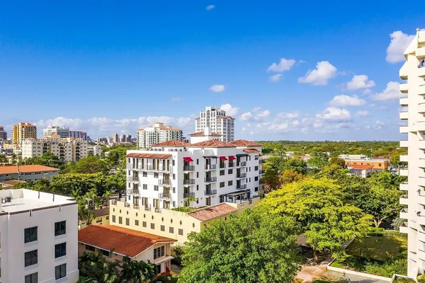 a view of a city with tall buildings