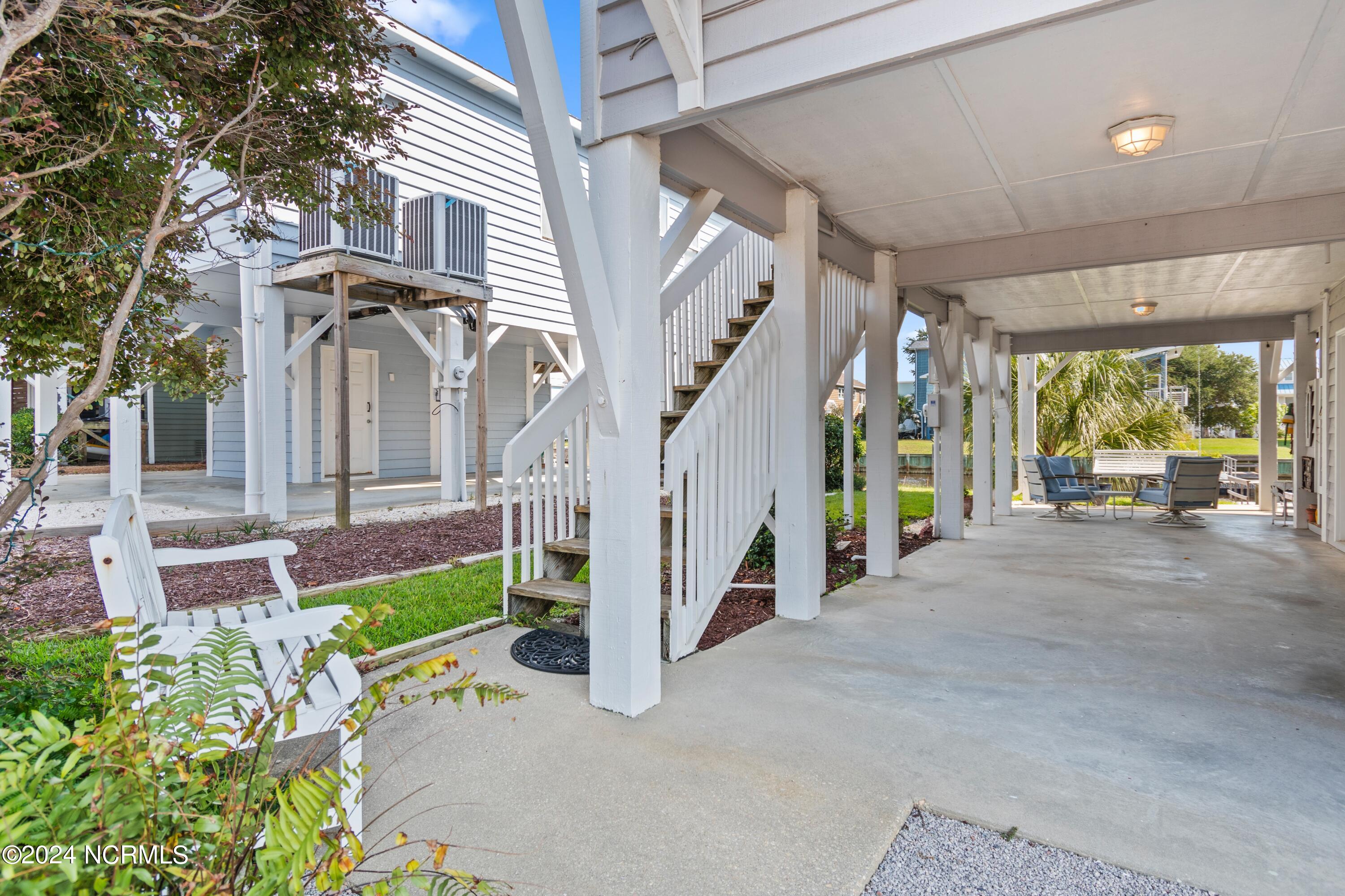 415 Sailfish Street Sunset Beach, NC 28468 - Photo 36 of 63 Entrance to home on left.