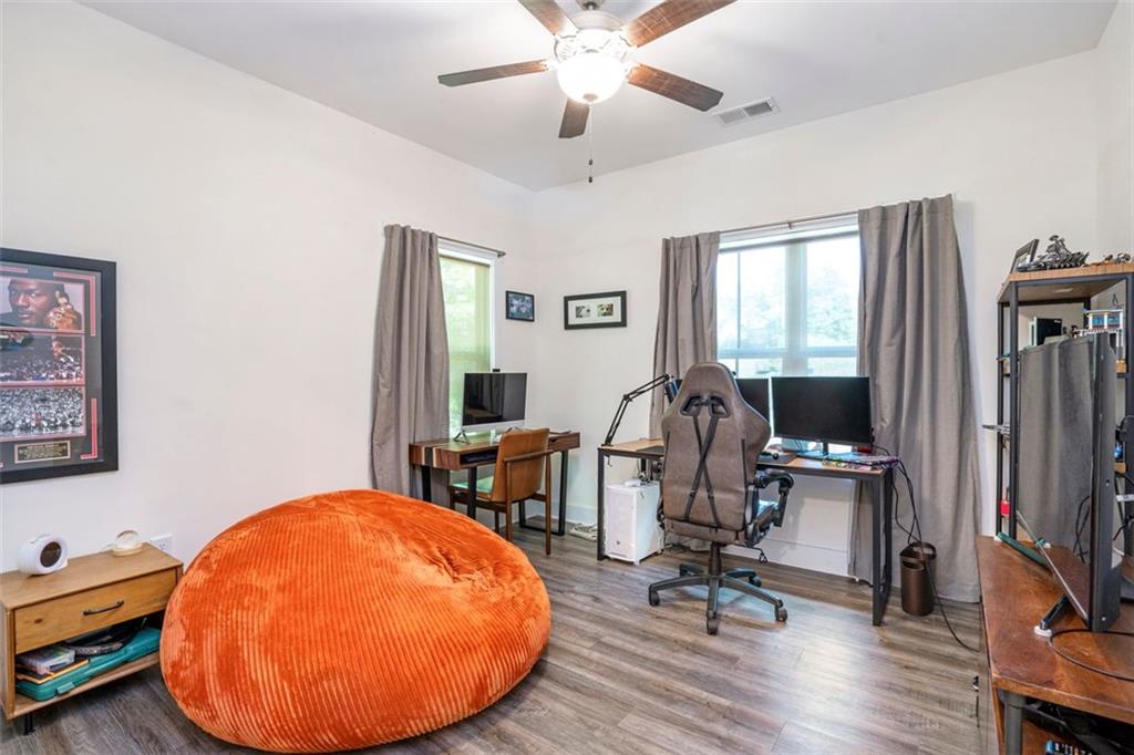 225 Hamrick Road Bremen, GA 30110 - Photo 23 of 61 a view of a workspace with furniture and a window