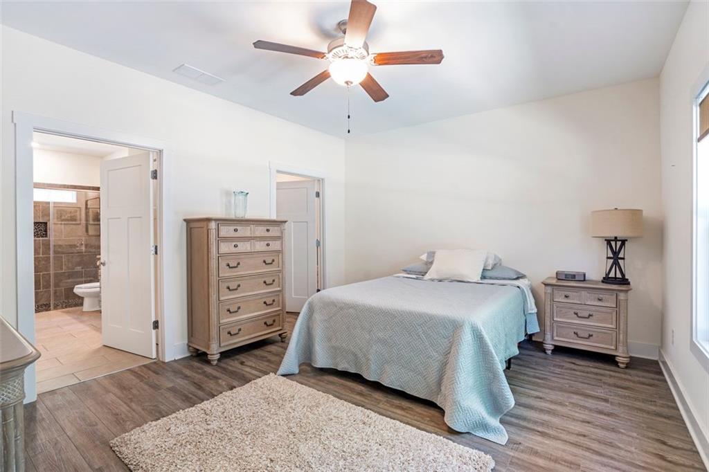 225 Hamrick Road Bremen, GA 30110 - Photo 41 of 61 a bedroom with a bed and a dresser