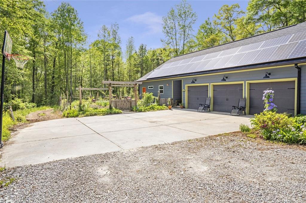 225 Hamrick Road Bremen, GA 30110 - Photo 44 of 61 front view of a house with a yard and potted plants