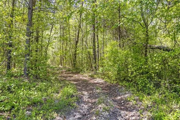 a view of a houses with a yard