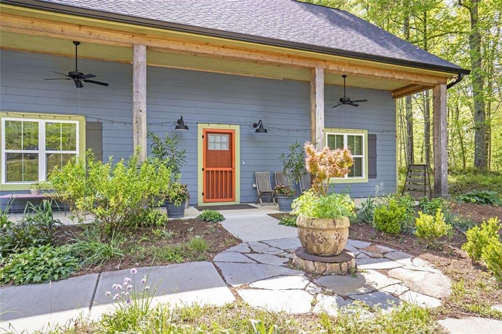 225 Hamrick Road Bremen, GA 30110 - Photo 5 of 61 a front view of a house with a garden
