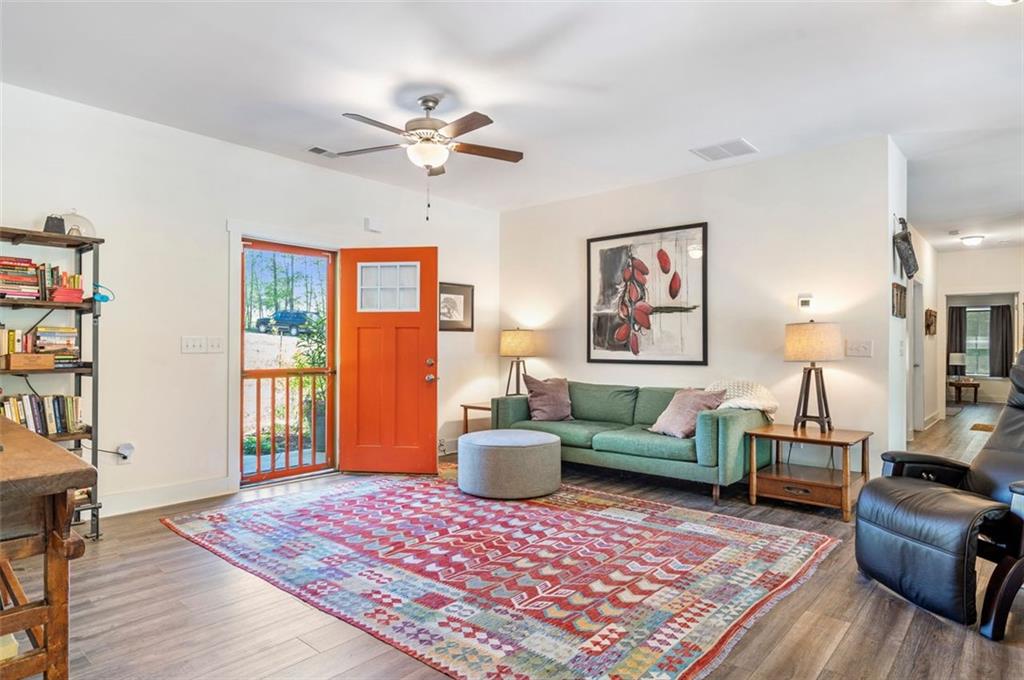 225 Hamrick Road Bremen, GA 30110 - Photo 6 of 61 a living room with furniture and a wooden floor