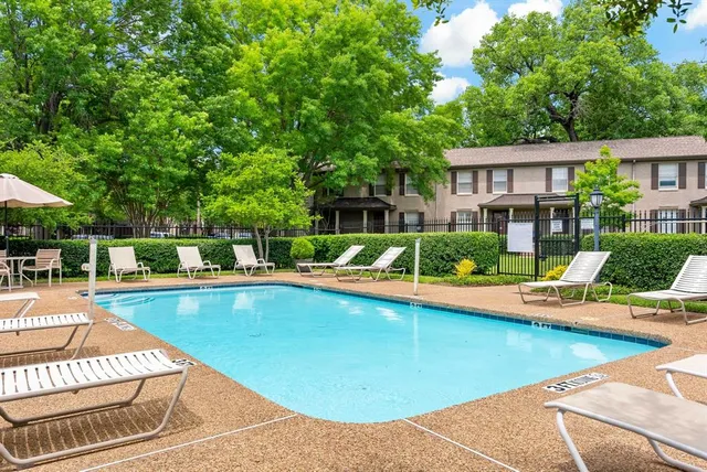 a view of a house with swimming pool