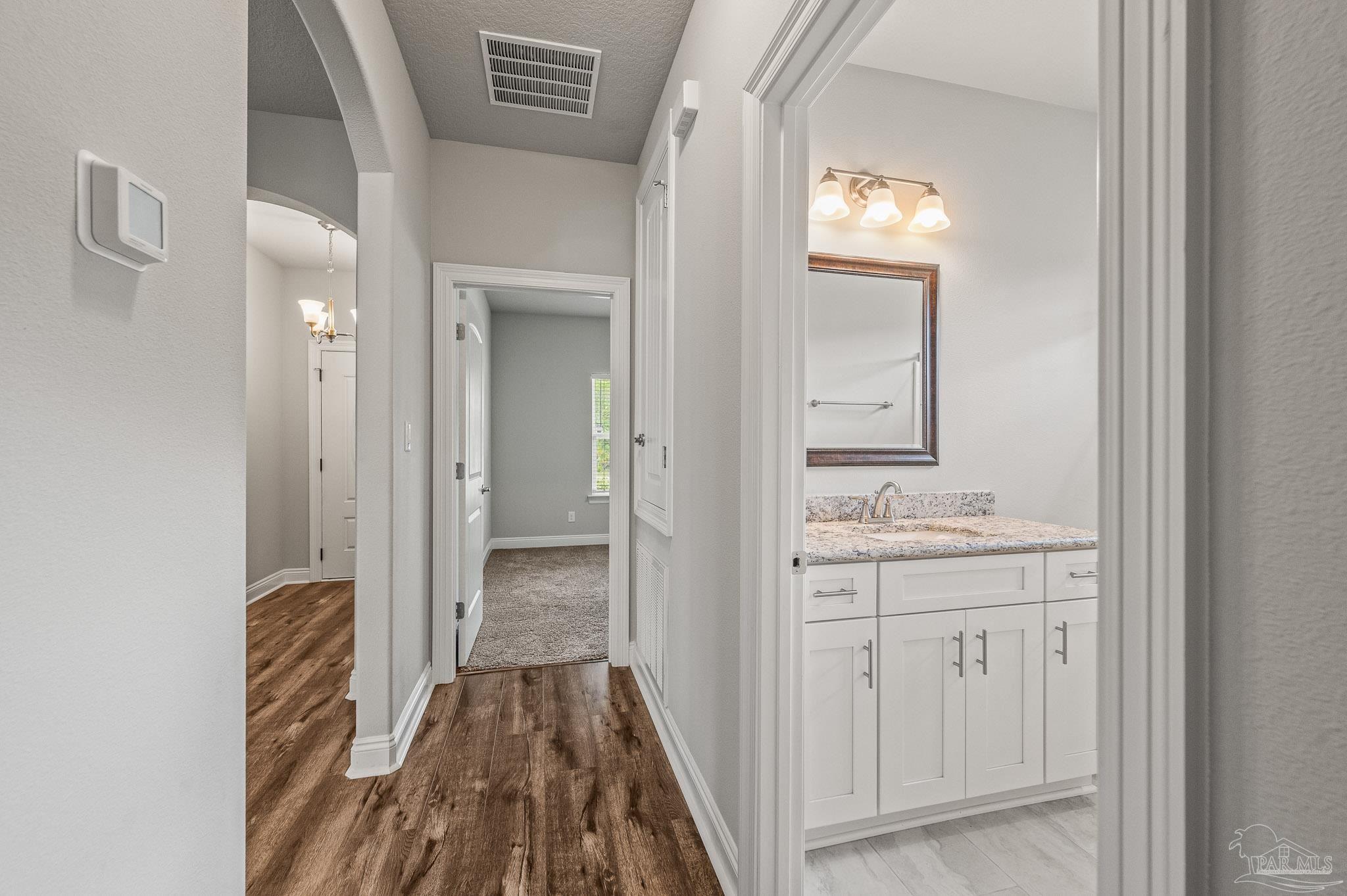7279 Gordon Evans Road Navarre, FL 32566 - Photo 35 of 40 In view is full bath.