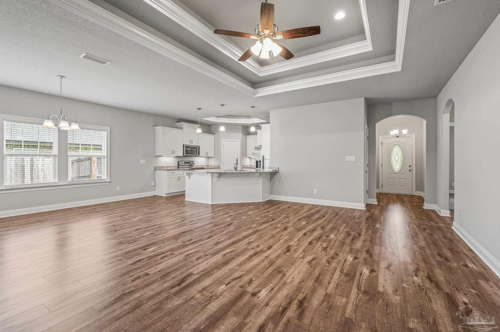 7279 Gordon Evans Road Navarre, FL 32566 - Photo 7 of 40 In view is lighted double trey ceiling.