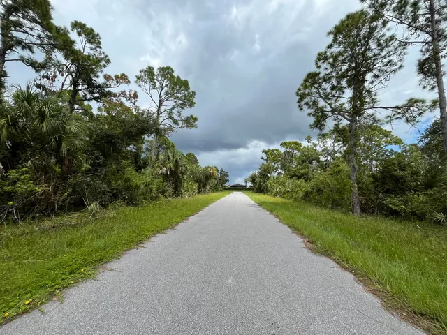 a view of a street with a houses