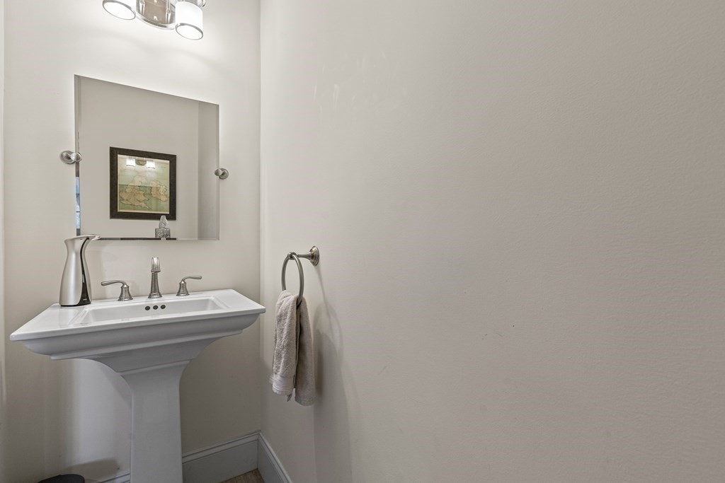 5 Fairview Road Framingham, MA 01702 - Photo 12 of 36 a bathroom with a sink and a mirror