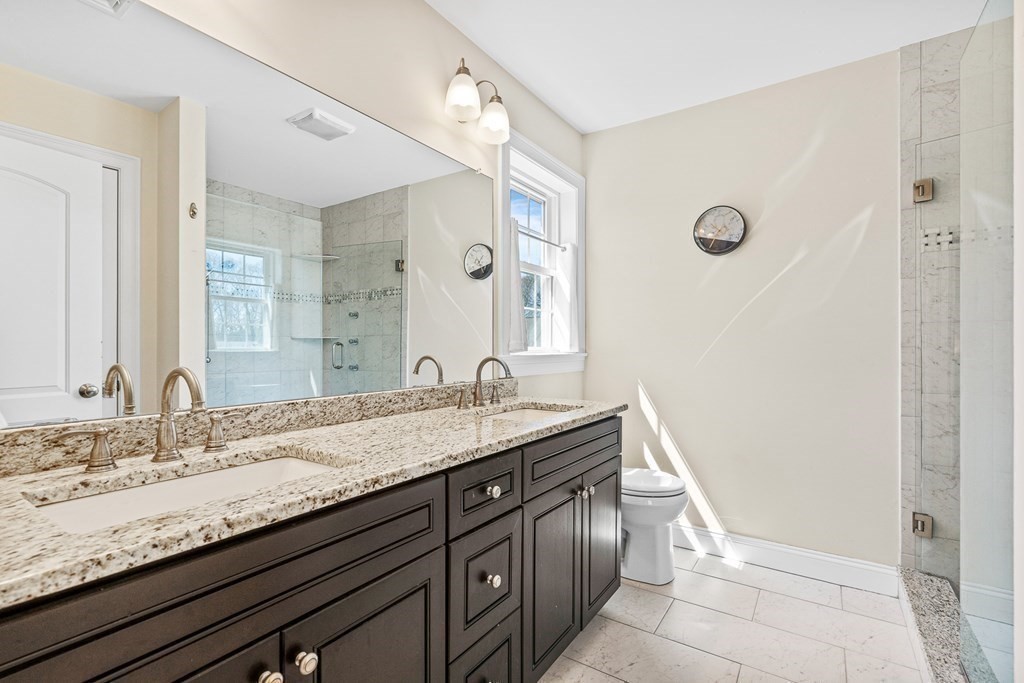 5 Fairview Road Framingham, MA 01702 - Photo 21 of 36 a bathroom with a granite countertop sink and a mirror