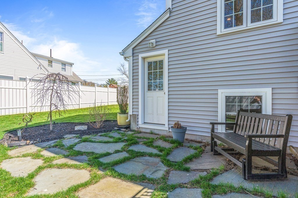 5 Fairview Road Framingham, MA 01702 - Photo 32 of 36 a view of backyard with a garden and deck