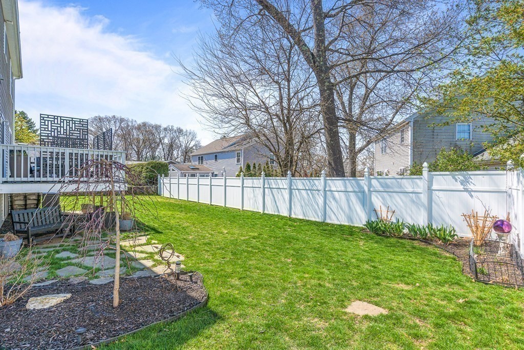 5 Fairview Road Framingham, MA 01702 - Photo 33 of 36 a view of a garden with a slide