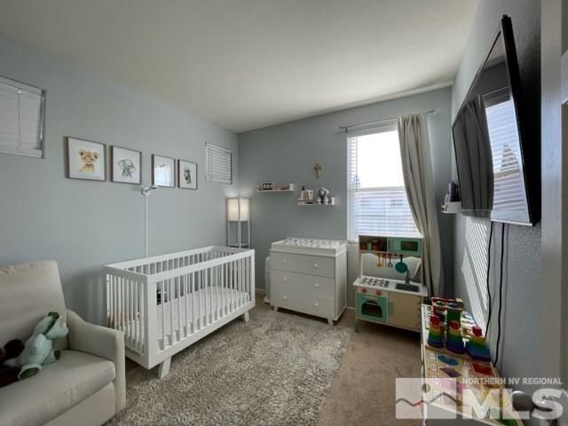 2115 Stanhope Lane Reno, NV 89502 - Photo 12 of 15 a room with furniture and a window