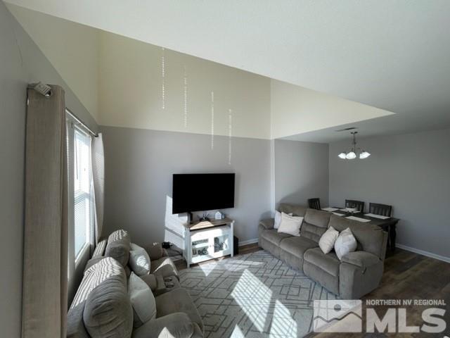 2115 Stanhope Lane Reno, NV 89502 - Photo 2 of 15 a living room with furniture and a flat screen tv