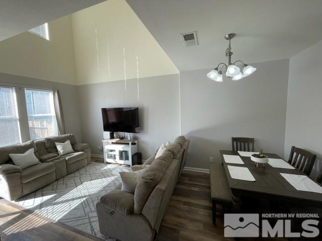2115 Stanhope Lane Reno, NV 89502 - Photo 3 of 15 a living room with furniture or chandelier and a flat screen tv