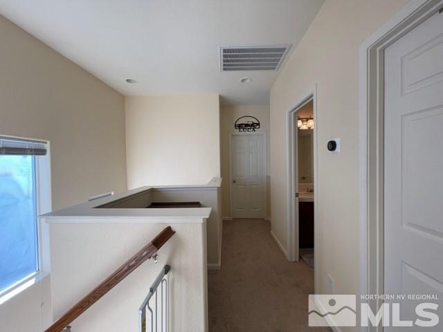 2115 Stanhope Lane Reno, NV 89502 - Photo 7 of 15 a kitchen with a sink and a refrigerator