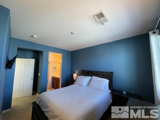 2115 Stanhope Lane Reno, NV 89502 - Photo 8 of 15 a bedroom with a bed and window