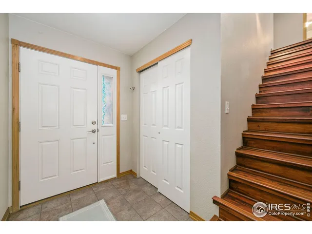 a view of entryway with stairs