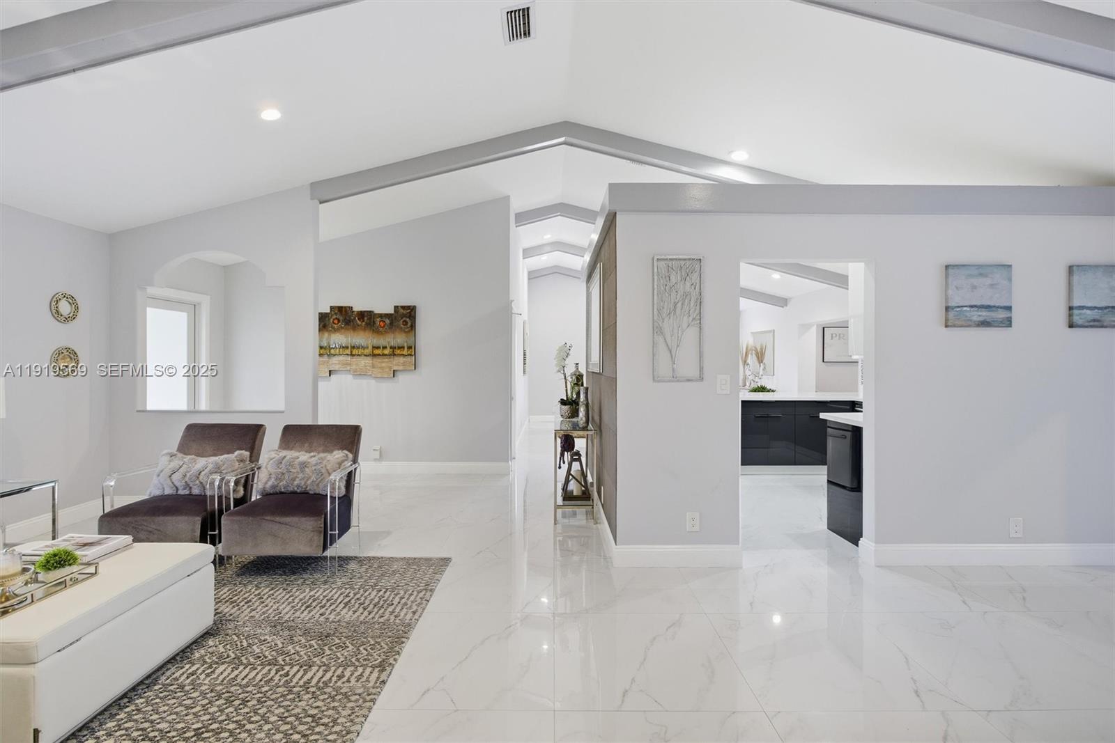 5601 Southwest 195th Terrace Southwest Ranches, FL 33332 - Photo 12 of 84 a living room with furniture and wooden floor