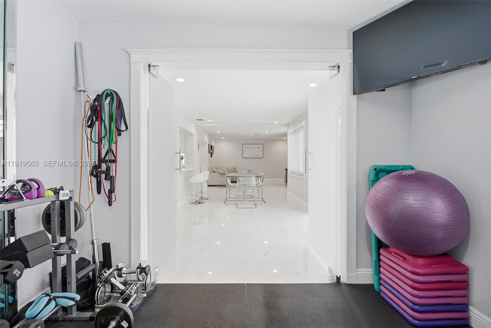 5601 Southwest 195th Terrace Southwest Ranches, FL 33332 - Photo 41 of 84 a view of a room with gym equipment