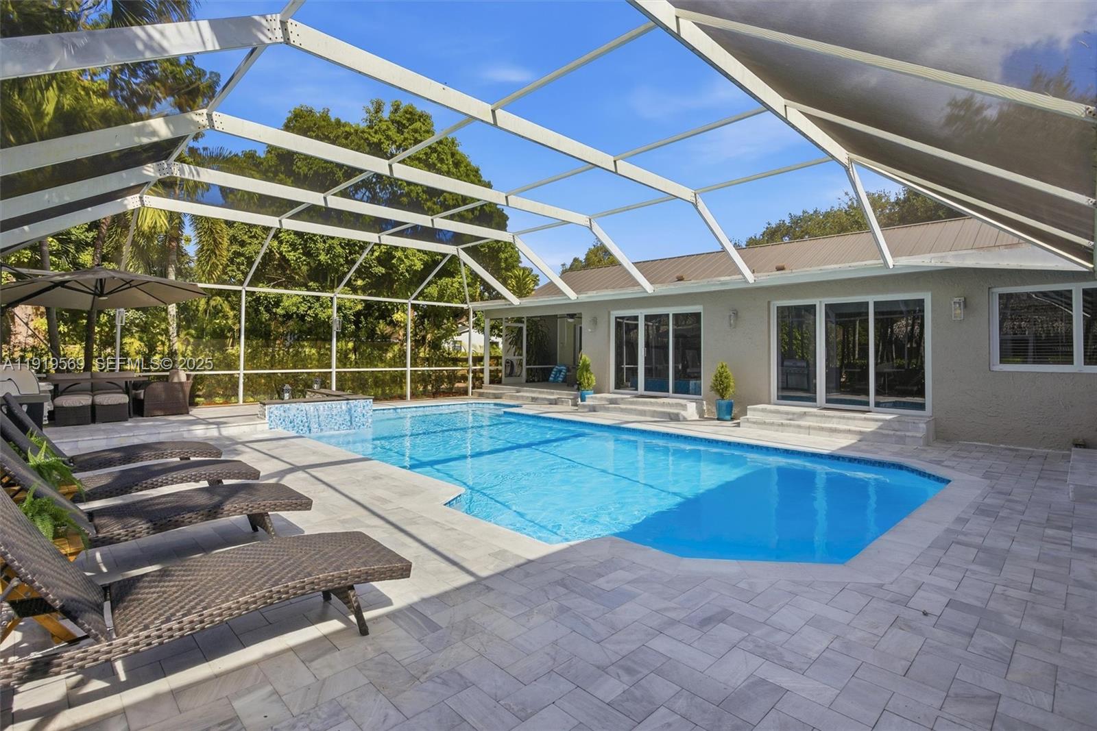 5601 Southwest 195th Terrace Southwest Ranches, FL 33332 - Photo 43 of 84 a view of a house with swimming pool