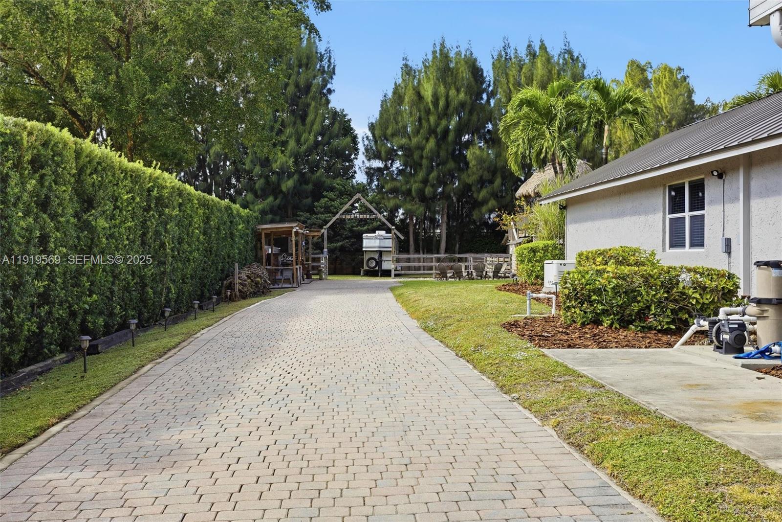 5601 Southwest 195th Terrace Southwest Ranches, FL 33332 - Photo 46 of 84 a view of outdoor space yard and house