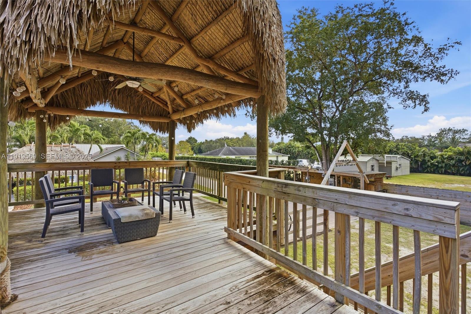 5601 Southwest 195th Terrace Southwest Ranches, FL 33332 - Photo 61 of 84 a view of a chairs and table on the wooden floor