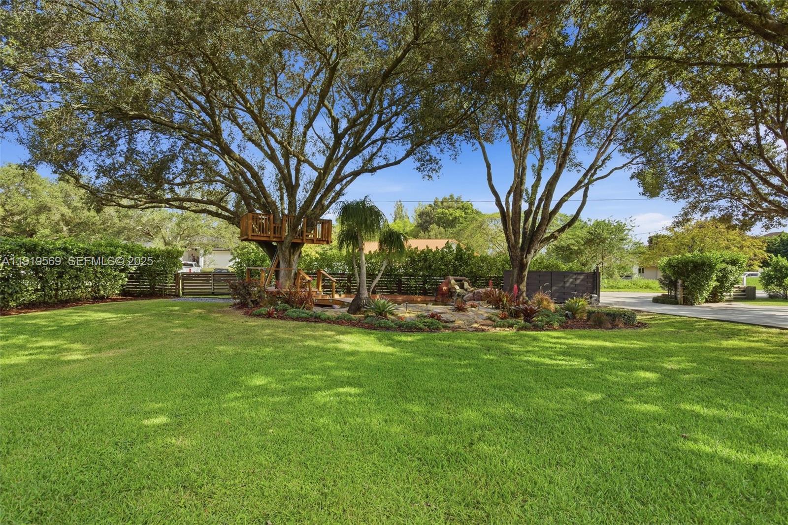 5601 Southwest 195th Terrace Southwest Ranches, FL 33332 - Photo 69 of 84 a view of a park with large trees